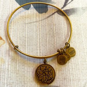 Alex and Ani charm bracelet.